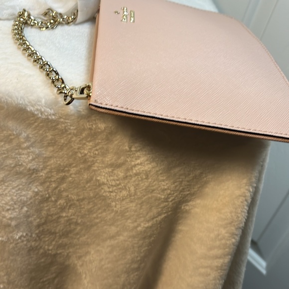Kate Spade Bag gold name on outside of bag, pink leather, gray and white lining - Picture 6 of 9